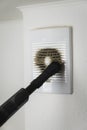 Very dirty and dusty white plastic ventilation grill. Ventilation shaft in the apartment dirty air filter. Royalty Free Stock Photo