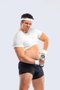 A funny fat man isolated on white background. Obesity and eating disorder. Concept for dietetics and fitness advertising