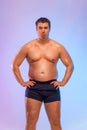 A very fat man want to lose weight and become a slim athlete. Fitness concept.