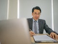 Very Happy asian business man in the office Royalty Free Stock Photo