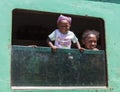 Very happy baby with a young African girl