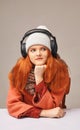 A very happy young girl listening to music in headphones Royalty Free Stock Photo