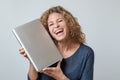 Very Happy Young Woman Holding a new laptop Royalty Free Stock Photo