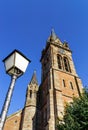 Very high belltower of cathedral in Dambach la Ville, France Royalty Free Stock Photo