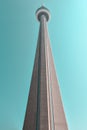 Very high modern concrete tower in a blue sky in daylight. Architecture concept