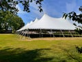 A very large majestic white party or wedding reception tent Royalty Free Stock Photo