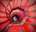 very long red spiral staircase Royalty Free Stock Photo