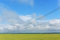 Very long wires and large power transmission poles Royalty Free Stock Photo