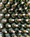 Very much stacked up wine bottles with corks Royalty Free Stock Photo