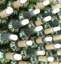 Very much stacked up wine bottles with corks Royalty Free Stock Photo