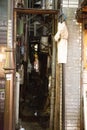 Very narrow dark alley in an Asian city