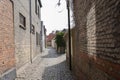 Very narrow stone lane in an old european city Royalty Free Stock Photo