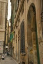 Very narrow street in the old town of Genoa