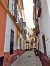 Very narrow traditional spanish street. Sevilla, Andalusia. Spain