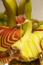 Very nice and artistically sliced fruits on a platter. Royalty Free Stock Photo