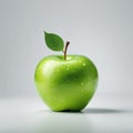 A green apple with its stick and green leaf on a white background Royalty Free Stock Photo