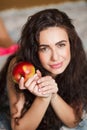 Very nice model of ethnic, there is a Red Apple Royalty Free Stock Photo