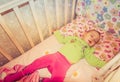 Very nice sweet baby sleeping in crib Royalty Free Stock Photo