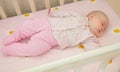 Very nice sweet baby sleeping in crib Royalty Free Stock Photo