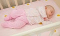 Very nice sweet baby sleeping in crib Royalty Free Stock Photo