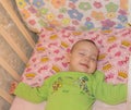 Very nice sweet baby sleeping in crib Royalty Free Stock Photo