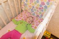 Very nice sweet baby sleeping in crib Royalty Free Stock Photo