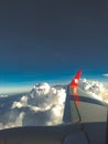 the view behind the plane window in the daytime