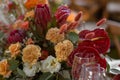 A very nicely decorated wedding table appointments with beautiful decor with plates and serviettes in spring garden Royalty Free Stock Photo