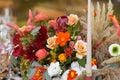 A very nicely decorated wedding table appointments with beautiful decor with plates and serviettes in spring garden Royalty Free Stock Photo