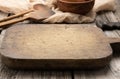 Very okd empty rectangular wooden cutting kitchen board on table