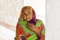 A very old Asian woman with a sad expression and wrinkles on her face Royalty Free Stock Photo