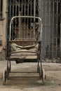 Very old baby carriage in old house Royalty Free Stock Photo