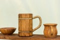 Ancient Wooden Beer Mug on Rustic Shelf - Medieval Drinkware Concept Royalty Free Stock Photo