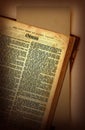 Very old Bible opened to the book of Genesis