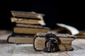 Very old book and key on an old wooden table. Old room, wooden t Royalty Free Stock Photo