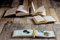 Very old book and key on an old wooden table. Old room, wooden t Royalty Free Stock Photo