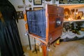 A very old camera on a shelf. Camera in working order. Camera on a wooden stand Royalty Free Stock Photo
