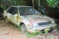 Very old car in the forest. Royalty Free Stock Photo