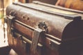 Very old chest like a treasure box in some grunge interior. Royalty Free Stock Photo