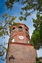 A very old church clock/bell tower with a nice blue sky. Royalty Free Stock Photo