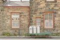 Old milk churns on a cart, goathland station, yorkshire, england Royalty Free Stock Photo