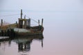 Very old fishing boat awaiting scrapping Royalty Free Stock Photo