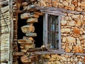 The very old wooden door on the stone house