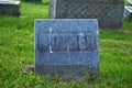 Very old moss covered headstone in a cemetery father mother Royalty Free Stock Photo