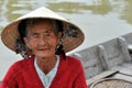 Very old native woman from Vietnam with the traditional hat