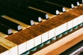 Very old piano keyboard with the signs of time. Ancient keys with dirt on old wooden grand piano. Vintage music Royalty Free Stock Photo