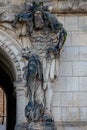 Very old statute of scary gatekeeper, medieval warrior with weapon in historical downtown of Dresden, Germany