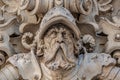 Very old statute of scary and heavy armed gatekeeper, medieval warrior with weapon in historical downtown of Dresden, Germany