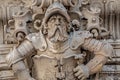 Very old statute of scary and heavy armed gatekeeper, medieval warrior with weapon in historical downtown of Dresden, Germany