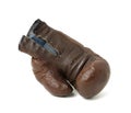 Very old vintage leather brown boxing glove isolated on white background. Sport equipment Royalty Free Stock Photo